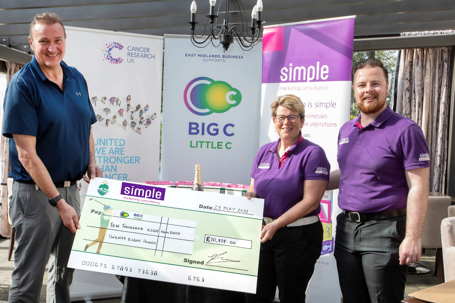 L-R Cheque Colin Shaw Bev Cook Elliot Cook